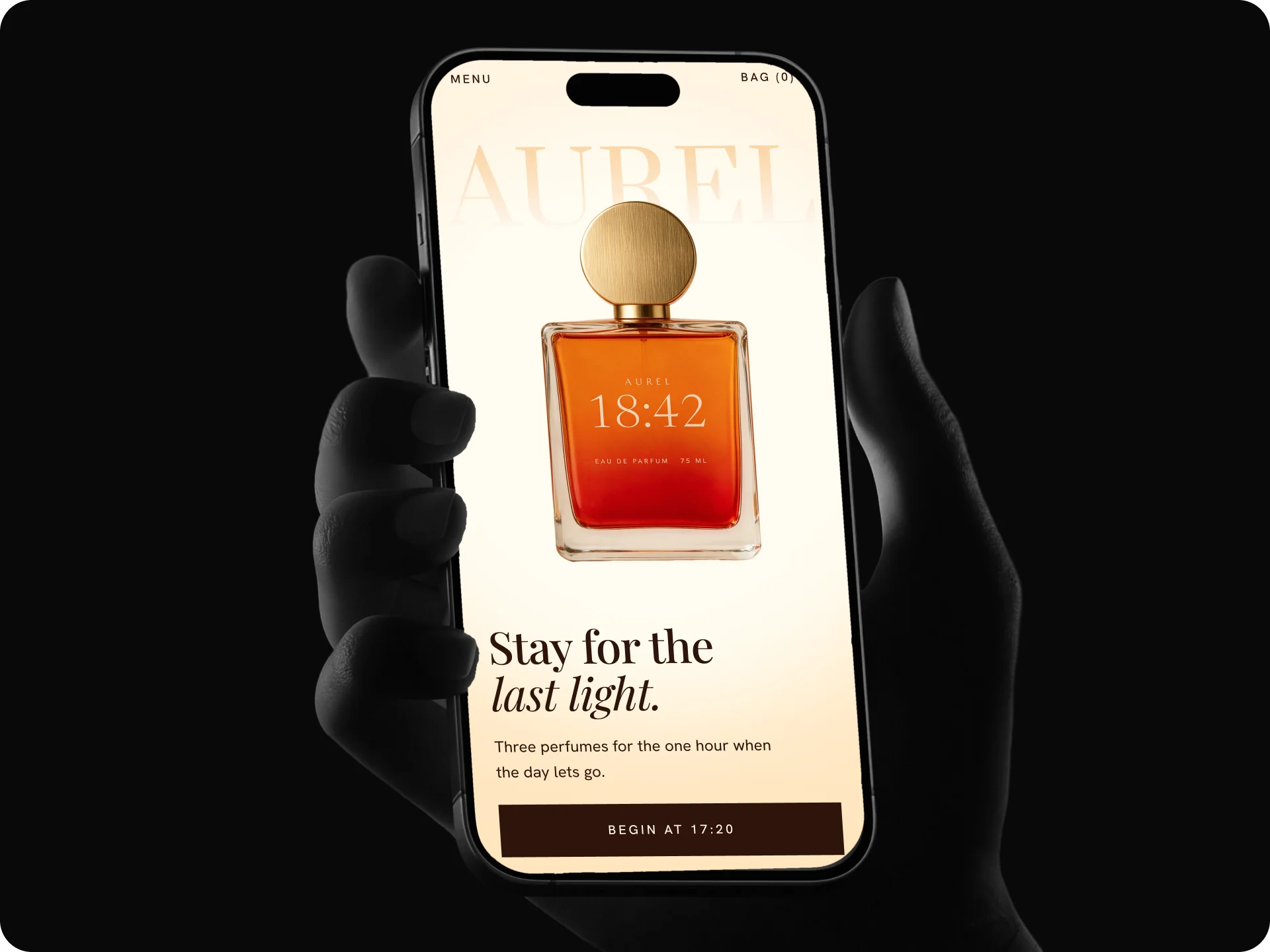 The Aurel mobile hero on a phone held in a hand against a black background.